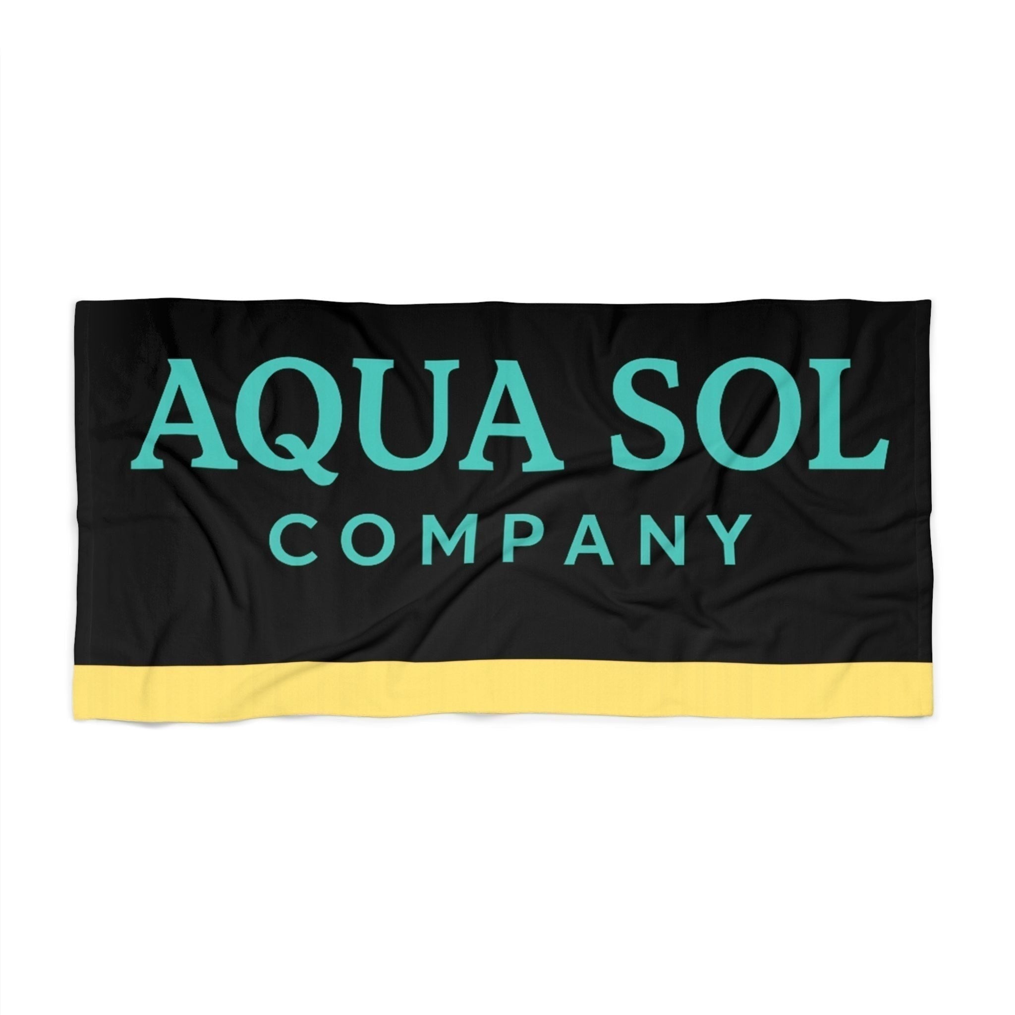 Aqua Sol Company beach towel featuring a black background with aqua blue logo text and a yellow bottom stripe.