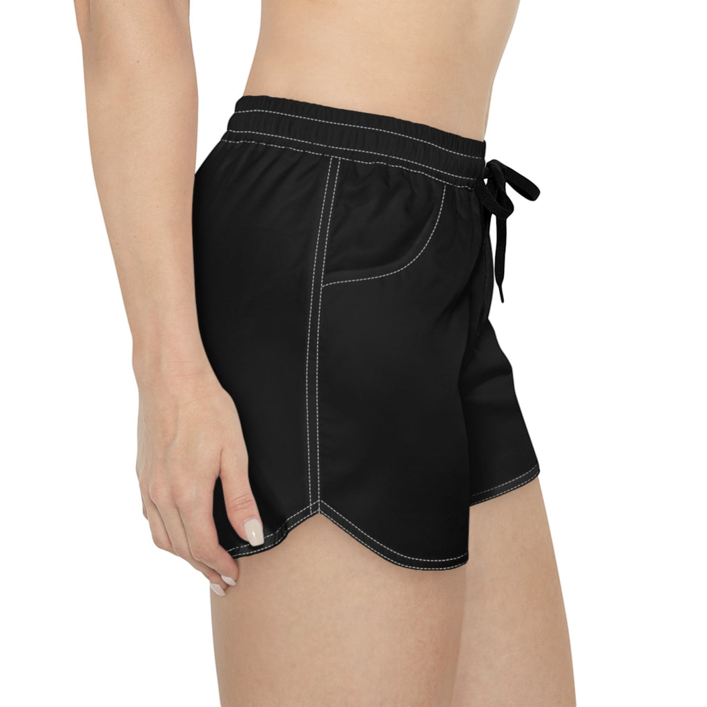 Aqua Sol Company black quick-dry coastal shorts with white contrast stitching, elastic waistband, and side pockets.